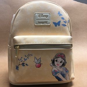 Disney Loungefly Snow White mini backpack purse.
